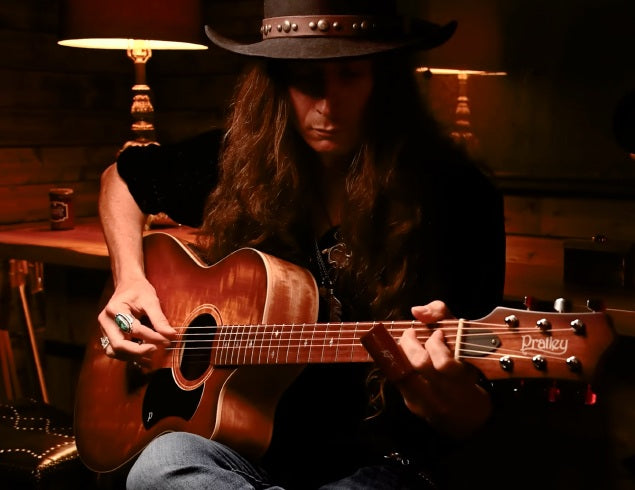 Justin Johnson playing his Pratley Acoustic Guitar